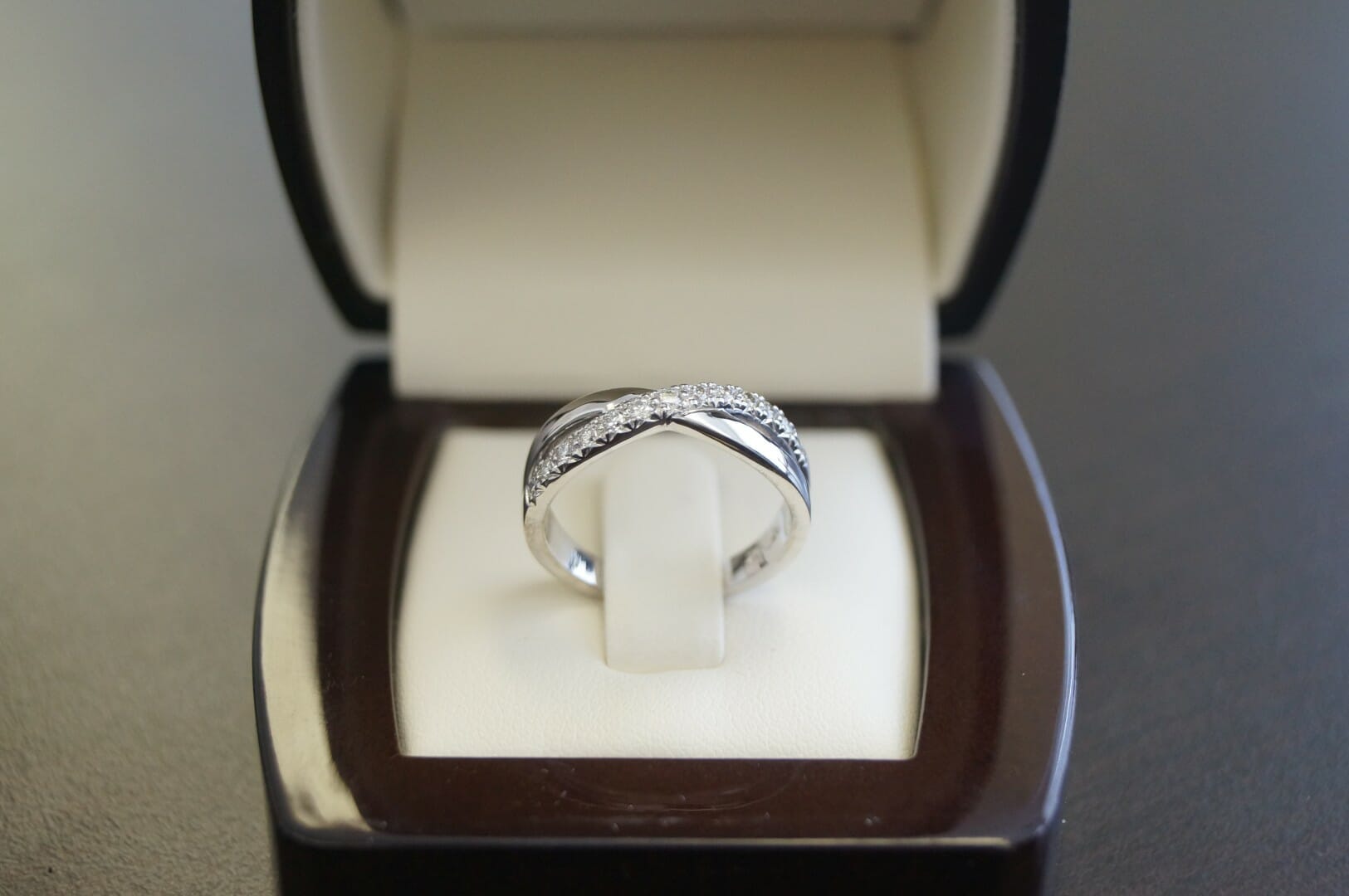 Picture of Diamond Wedding Band with Crossover Design in 19K White Gold