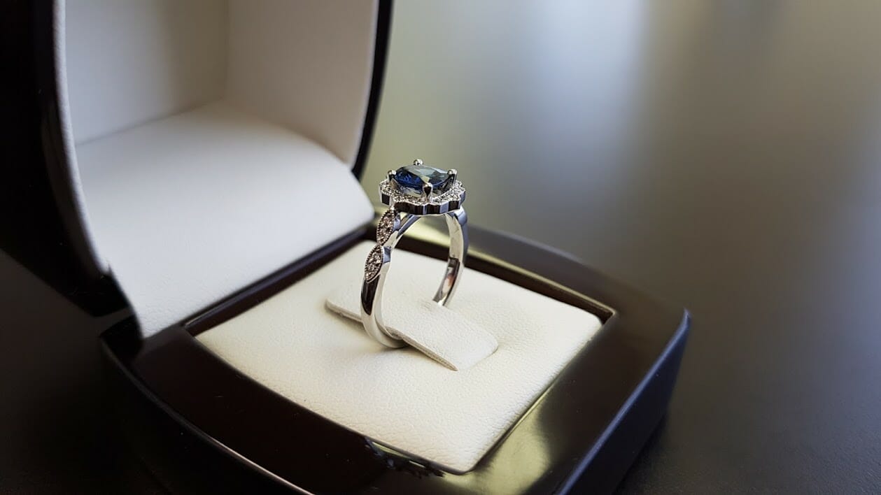 Picture of Blue Sapphire Center Gemstone in a Halo Engagement Ring